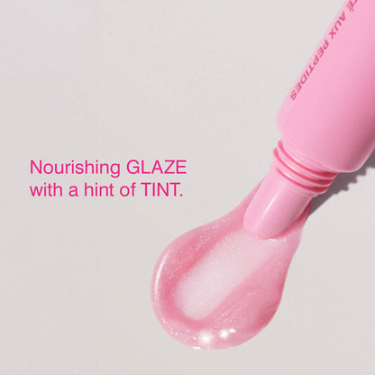 Rhode Peptide Lip Tint Nourishing Glaze - Jelly Bean - shimmery sheer baby pink + sweet