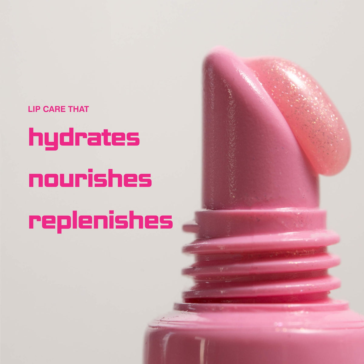 Rhode Peptide Lip Tint Nourishing Glaze - Jelly Bean - shimmery sheer baby pink + sweet