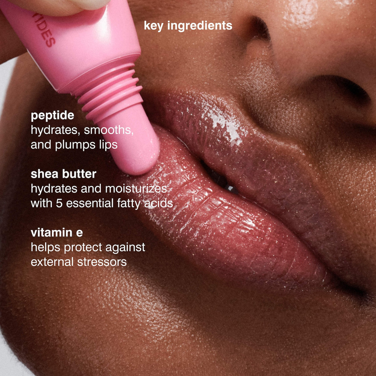 Rhode Peptide Lip Tint Nourishing Glaze - Jelly Bean - shimmery sheer baby pink + sweet